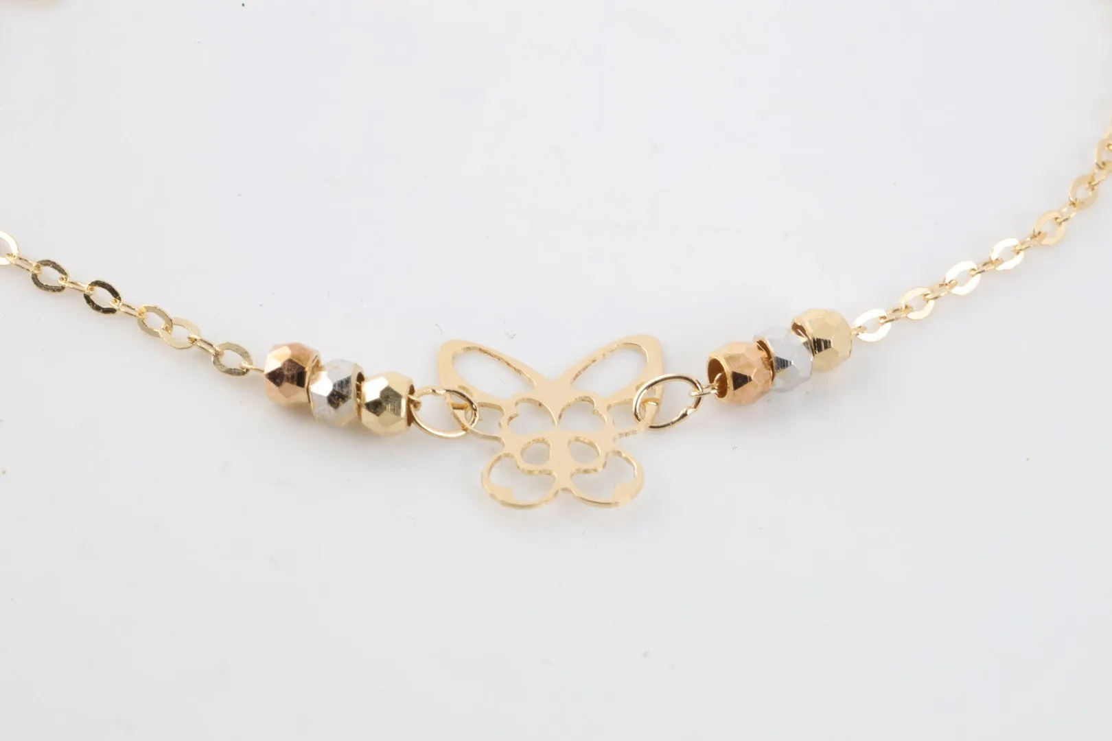 7.25" 18k Tri-Tone Gold Butterfly Bracelet (1.60g.)